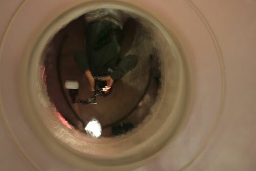 Justin Parr photos himself in a Luke Savisky mirrored installation